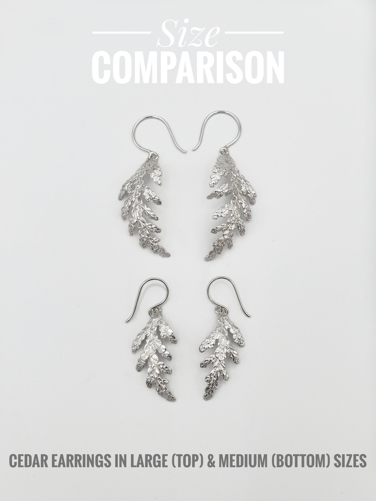 Two pairs of sterling silver cedar dangle earrings. The top pair is larger than bottom pair. Text reads "size comparison. Cedar earrings in large and medium"