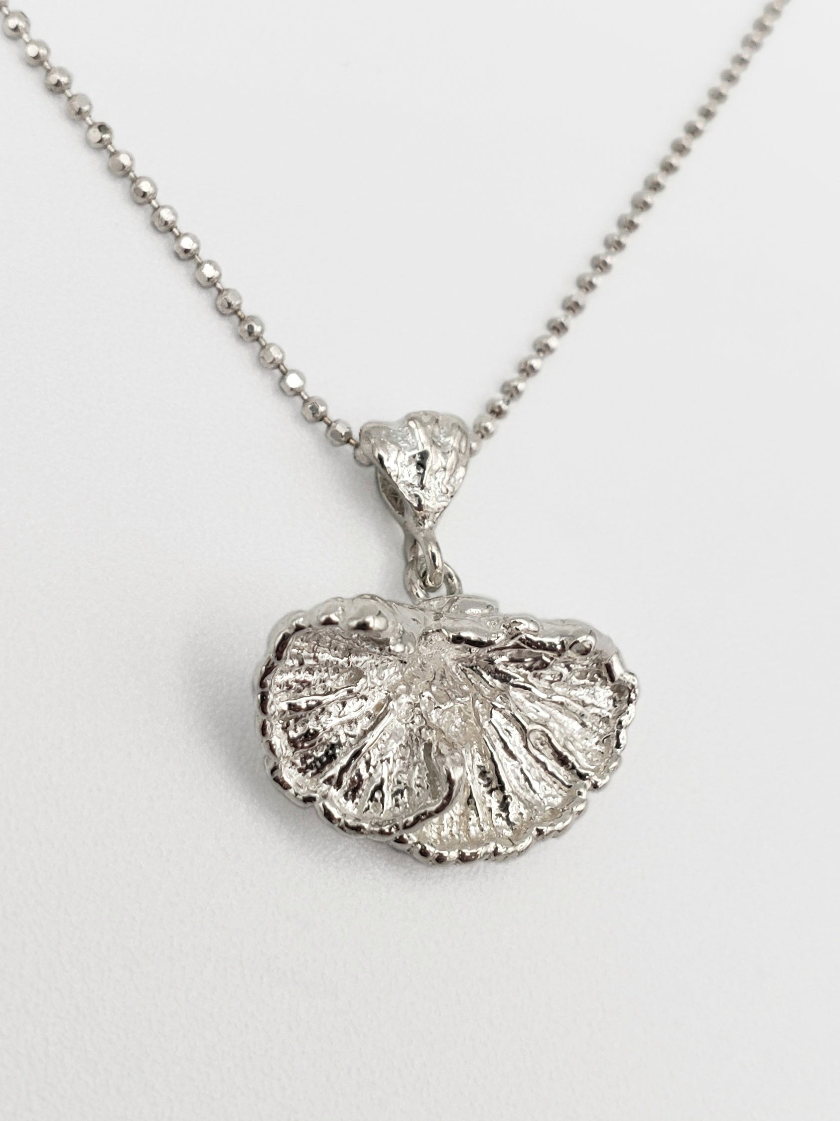 Sterling silver fungi pendant.