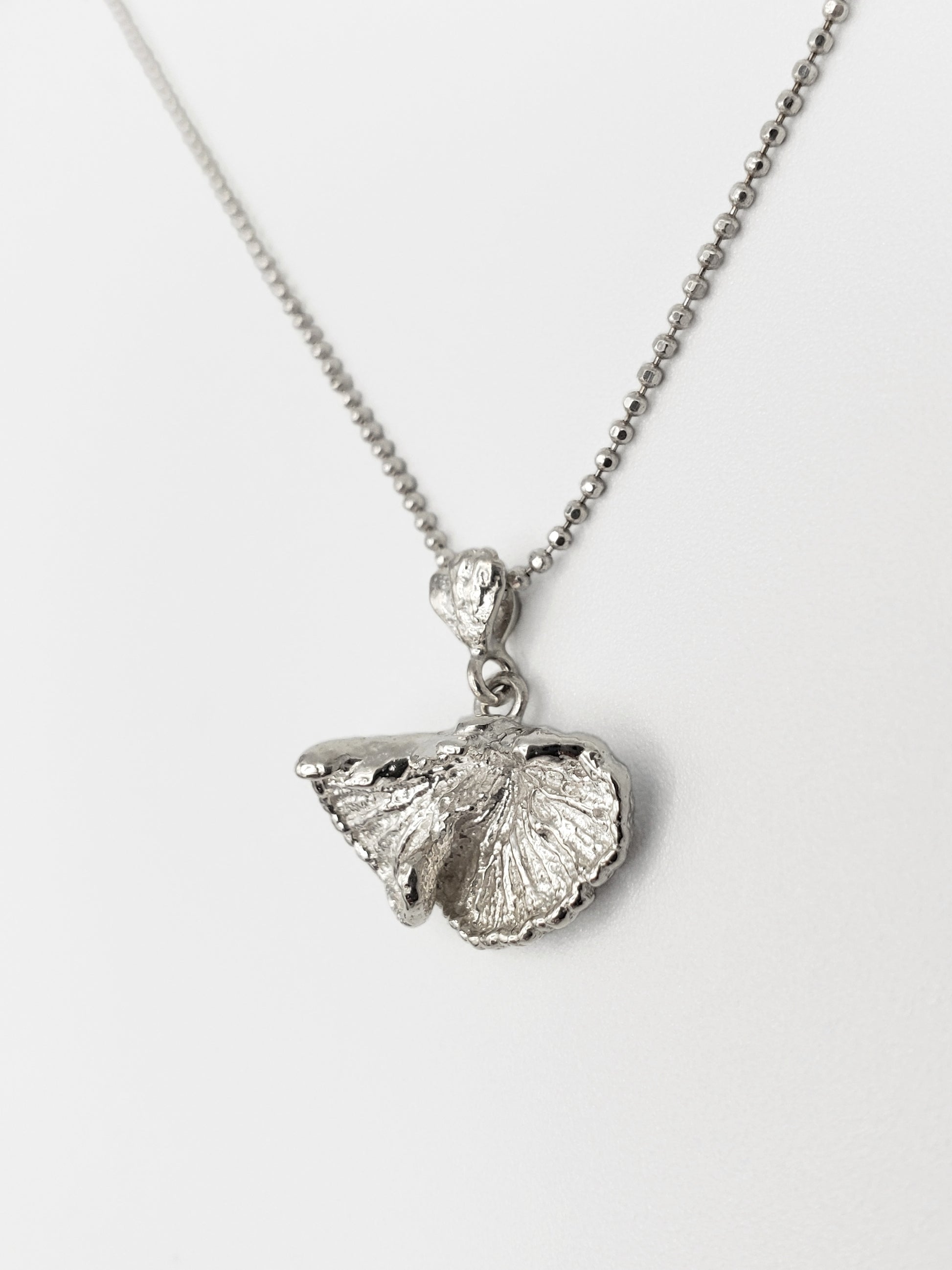 Sterling silver fungi pendant.