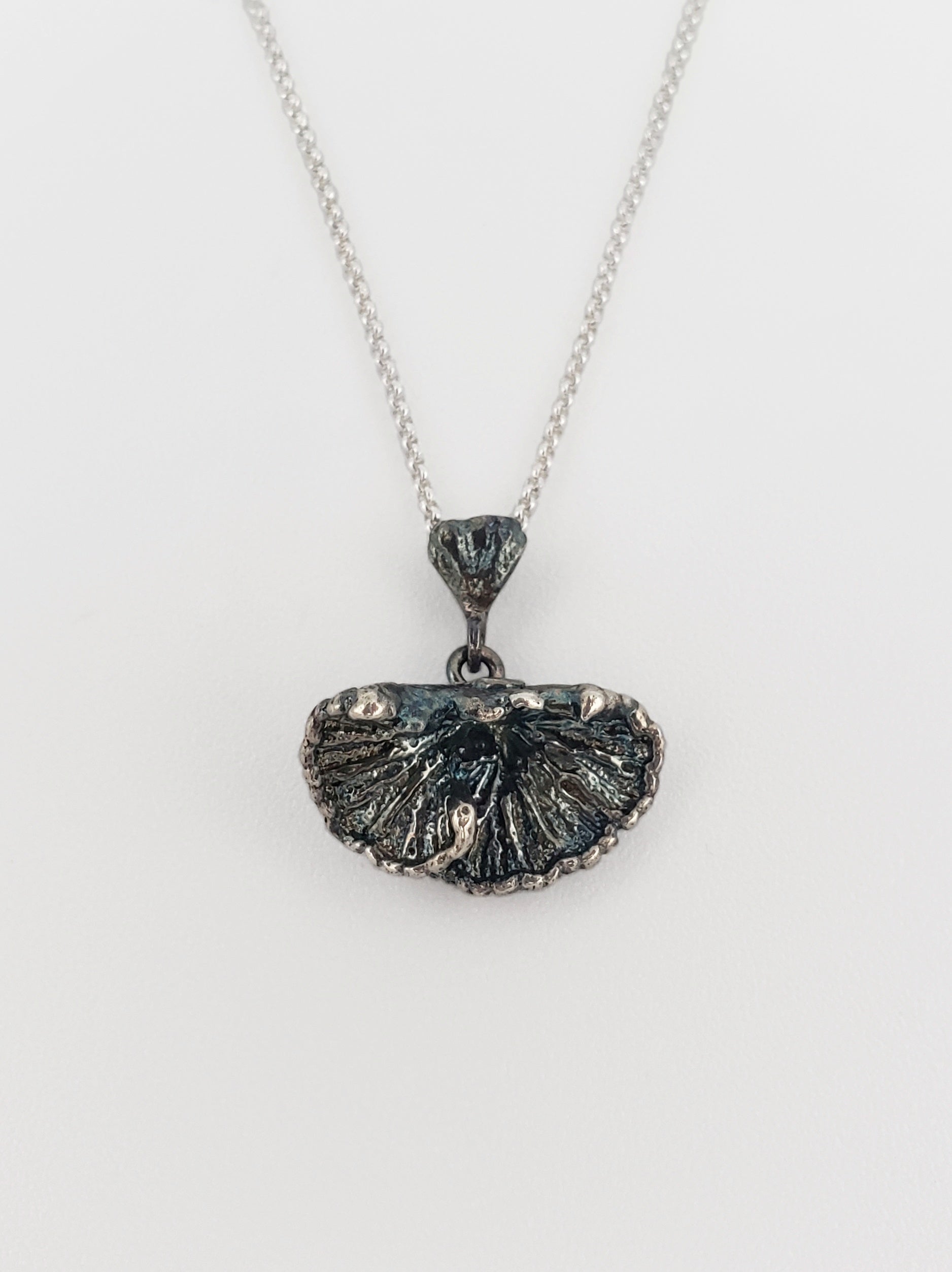 Oxidized sterling silver fungi pendant.