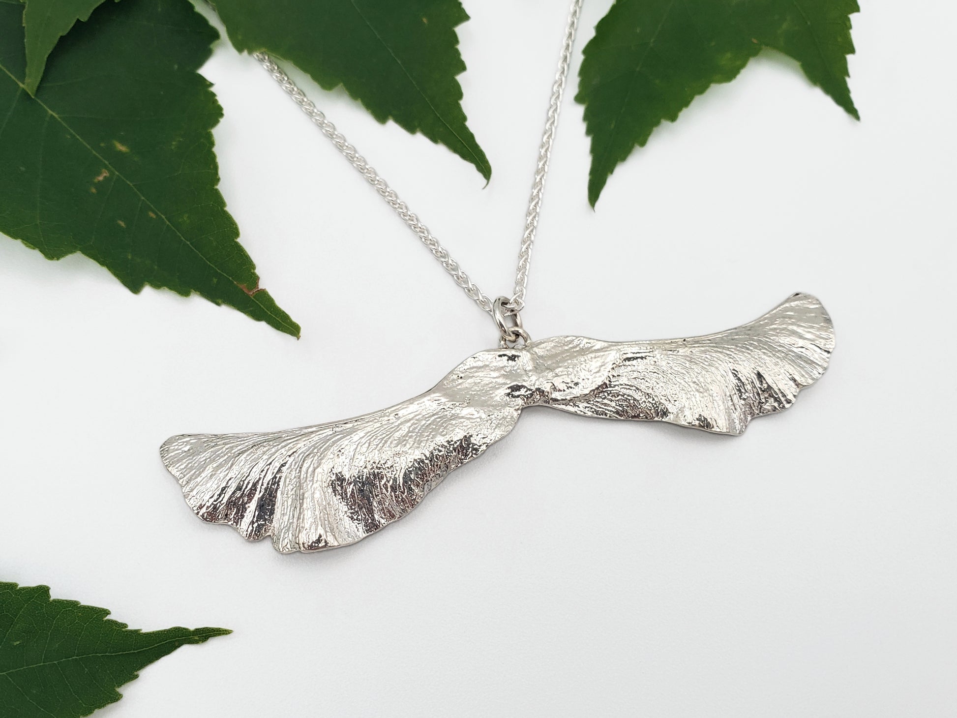 Silver maple key pendant